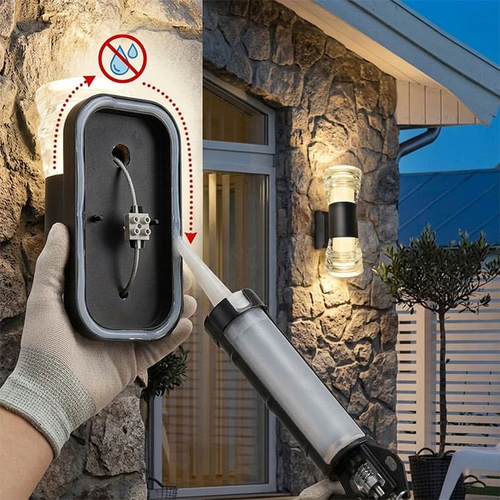 Hướng dẫn kỹ thuật đi keo Silicon mặt lưng đèn ốp tường khi thi công trên vách đá gồ ghề